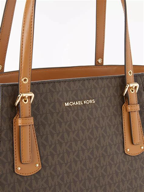 michael kors black purse with brown in the middle